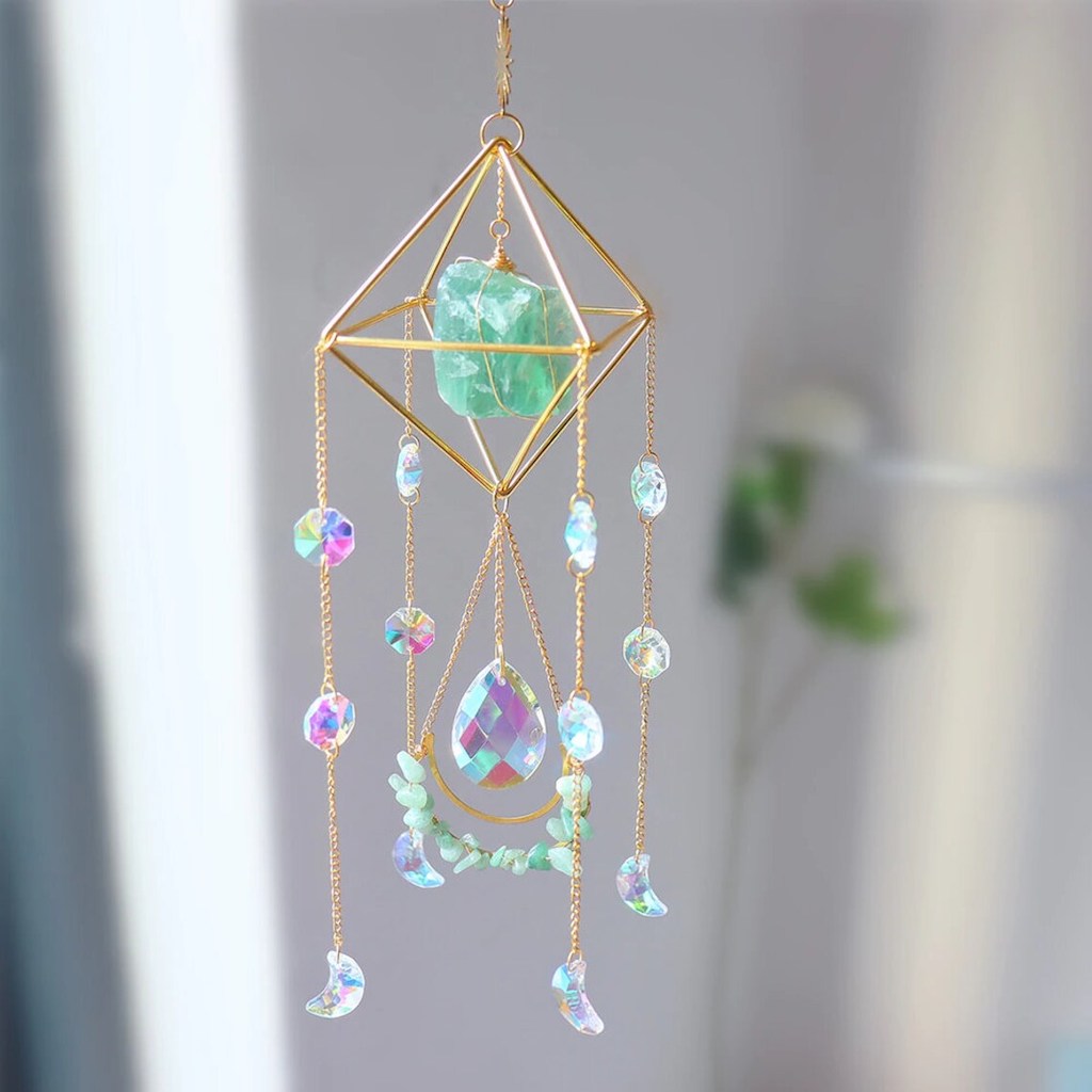Raw Crystal Suncatcher (Green Fluorite) hanging