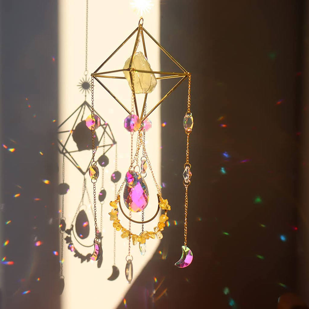 Raw Crystal Suncatcher (Citrine) in sunlight