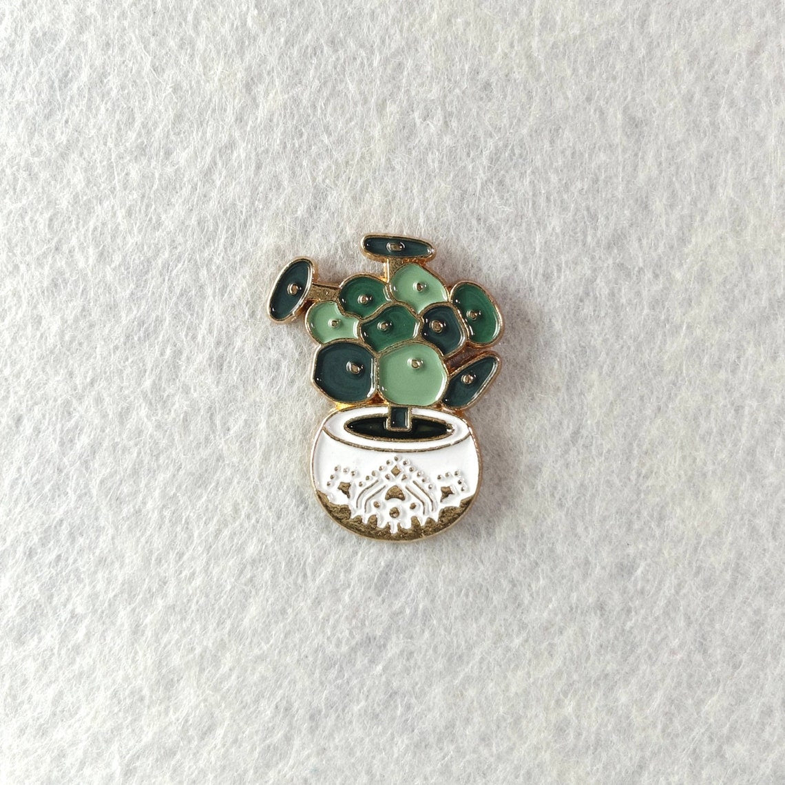 Chinese Money Plant (Pilea) Enamel Lapel Pin with white background