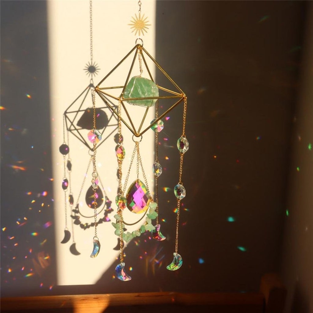 Raw Crystal Suncatcher (Green Fluorite) in sunlight