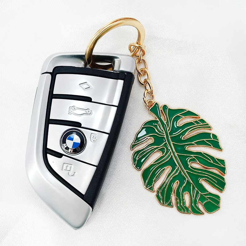 Monstera Leaf Enamel Keychain in a key