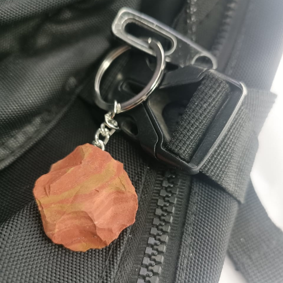 Raw Crystal Keychain (Red Jasper) on a bag