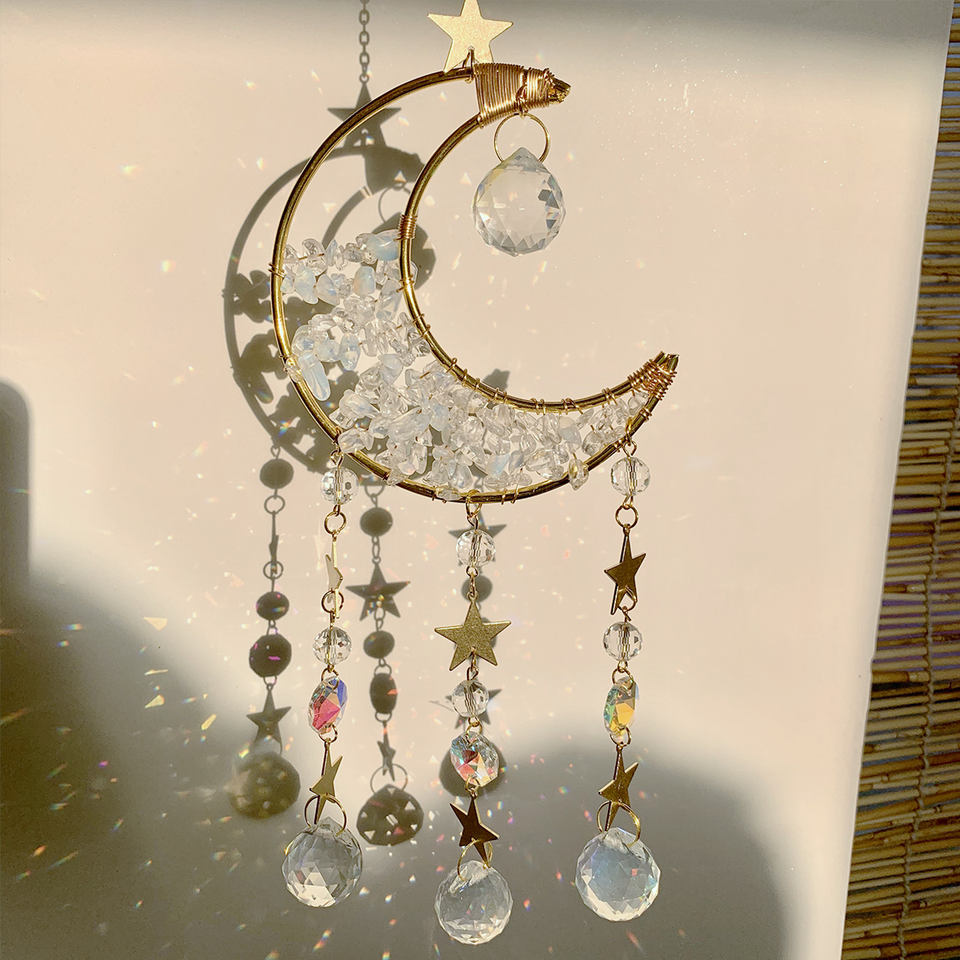 Quartz Moon Crescent Crystal Suncatcher in sunlight
