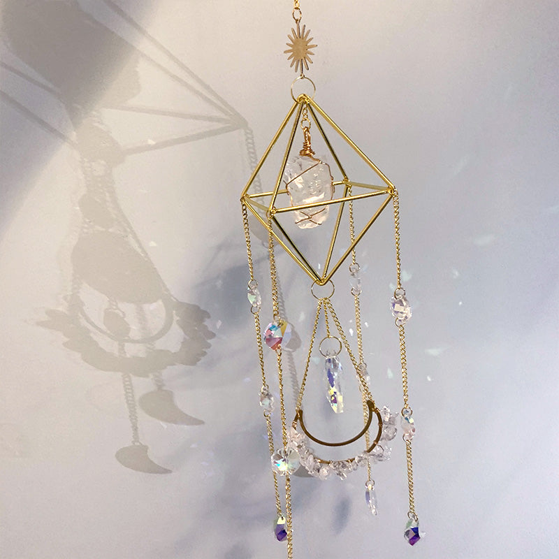 Raw Crystal Suncatcher (Clear Quartz) reflection