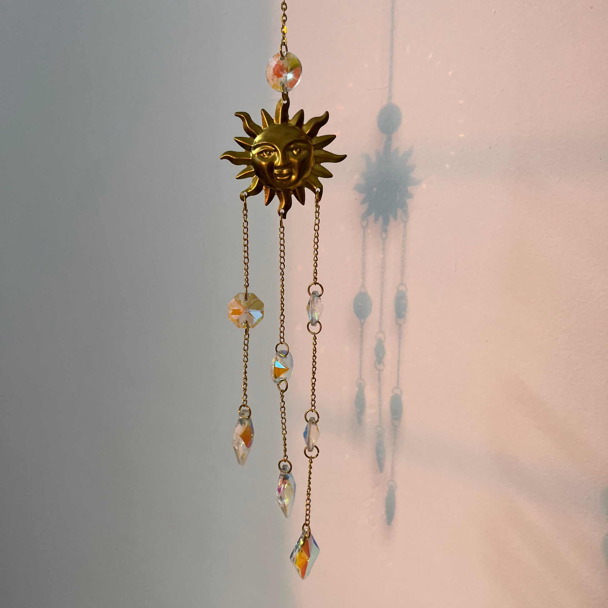 Surya Crystal Suncatcher in sunlight