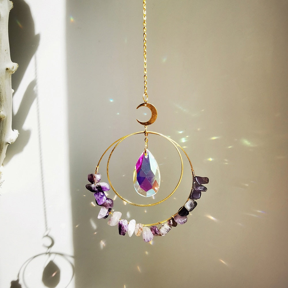 Hanging round quartz crystal chips suncatcher in sunlight