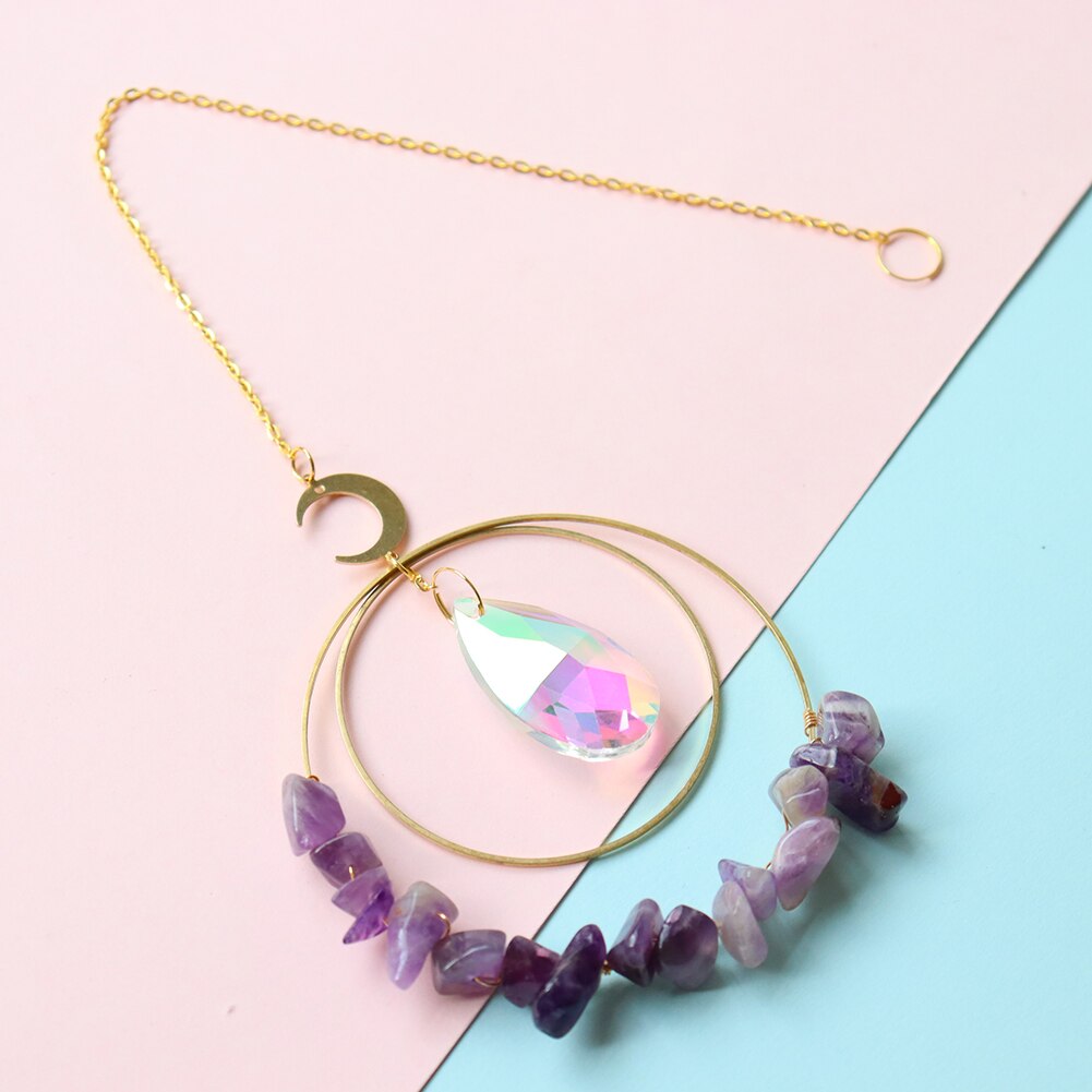 Hanging round quartz crystal chips suncatcher in sunlight