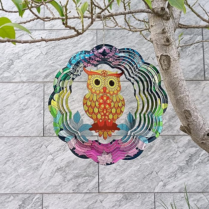 Kinetic Wind Spinner 3D Illusion Art (Mystical Owl) hanging on a tree