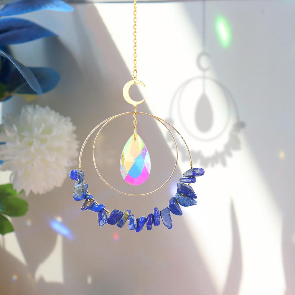 Lapis Lazuli hanging quartz crystal suncatcher in sunlight making rainbow