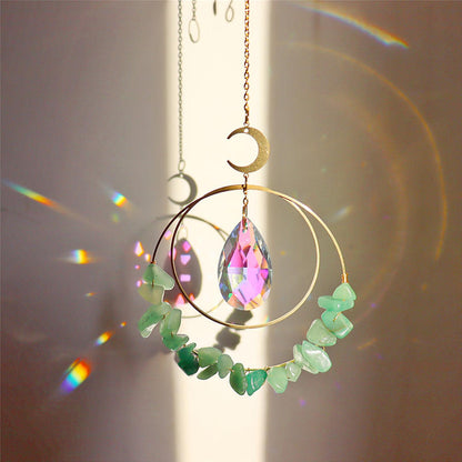 Aventurine Quartz Crystal suncatcher in sunlight making rainbow