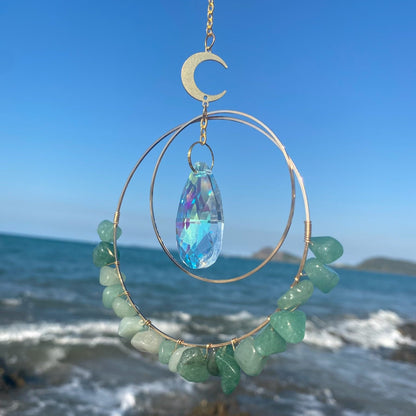 Aventurine Quartz Crystal suncatcher in sunlight